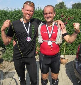 Brian Jensen og Jannik B. Trinderup i mål efter 42,2 varme km. Det var Brians første marathon - stort tillykke med den flotte præstation :-)